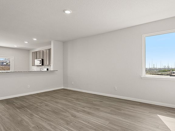 Family Room to Dining and Kitchen