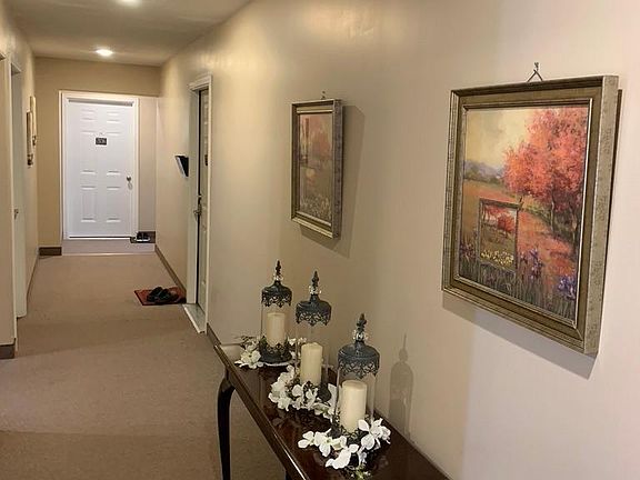 hallway and door to apartment