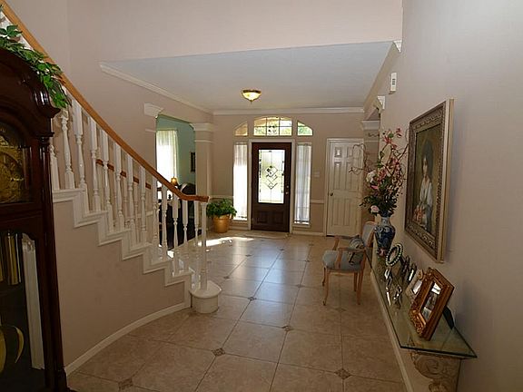 Updated Tile continues from the entry thru the family room and kitchen for a smooth look. Check out 