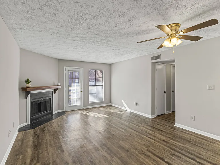 Our Montgomery apartments at Stratford Village offer inviting living areas with fireplaces and year-round ceiling fan comfort, professionally operated by Highlands Vista Group.