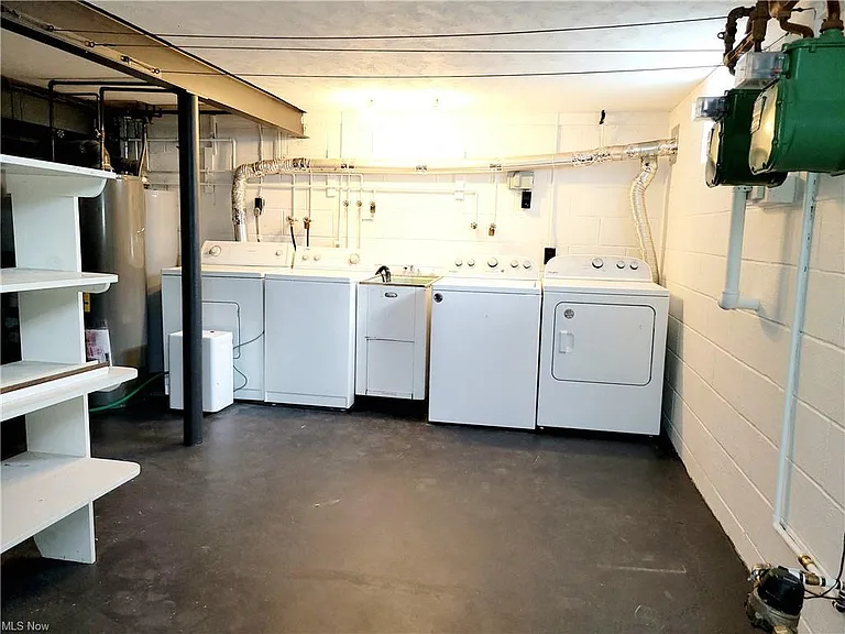 2 sets of washers and dryers in clean, dry, basement.
