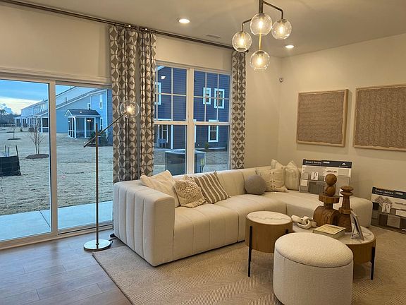 mother-in-law suit or media room with a private patio and backyard.