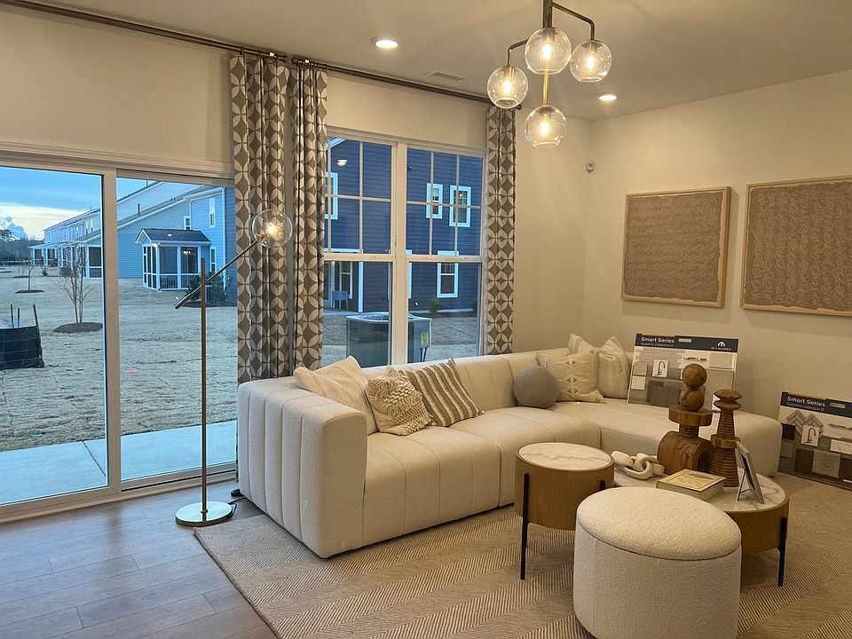 mother-in-law suit or media room with a private patio and backyard.