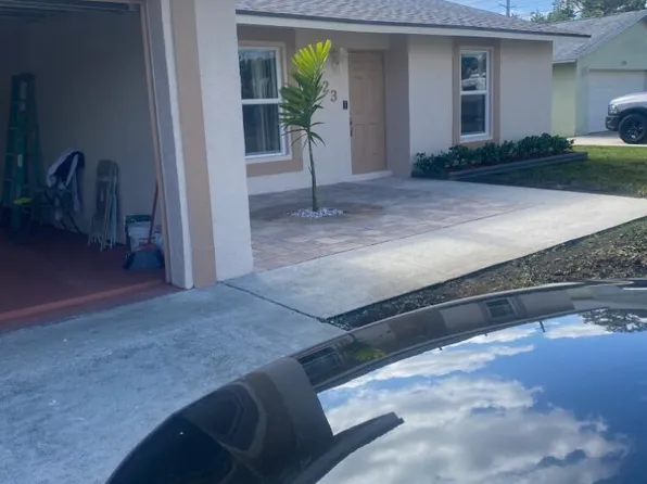 123 Raven Court NW, Royal Palm Beach, FL 33411