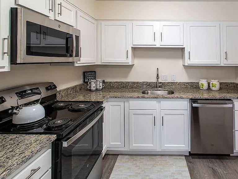 KITCHEN IN MODEL APARTMENT - COOLIDGE FLOORPLAN - ONE BEDROOM