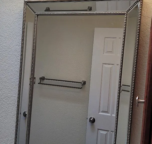Designer Mirror and Lighting in each Bathroom.