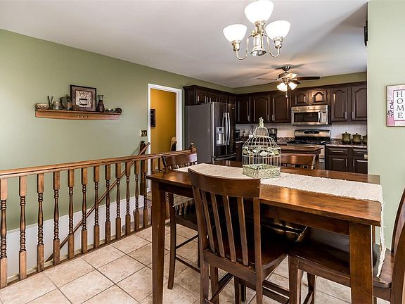 Breakfast room with open stairwell to finished LL!!