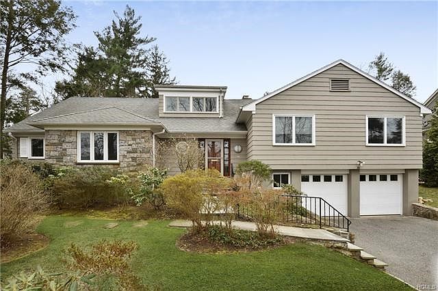 Bright and beautiful contemporary home in the heart of Fox Meadow!