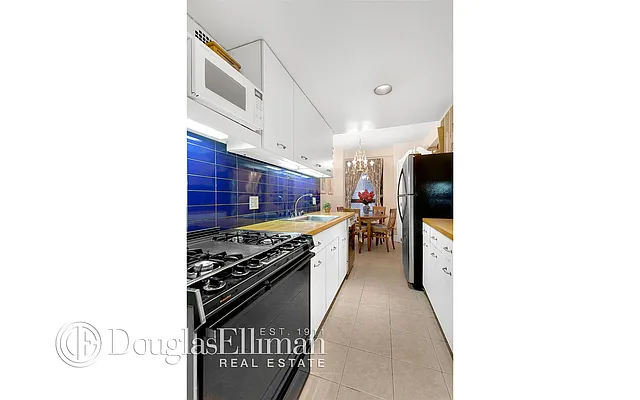 Sold by Douglas Elliman | media 6