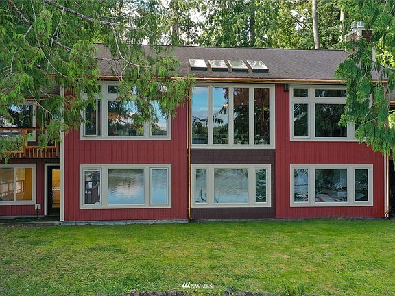 View of main home from the Sound, windows windows windows!! And skylights :). >