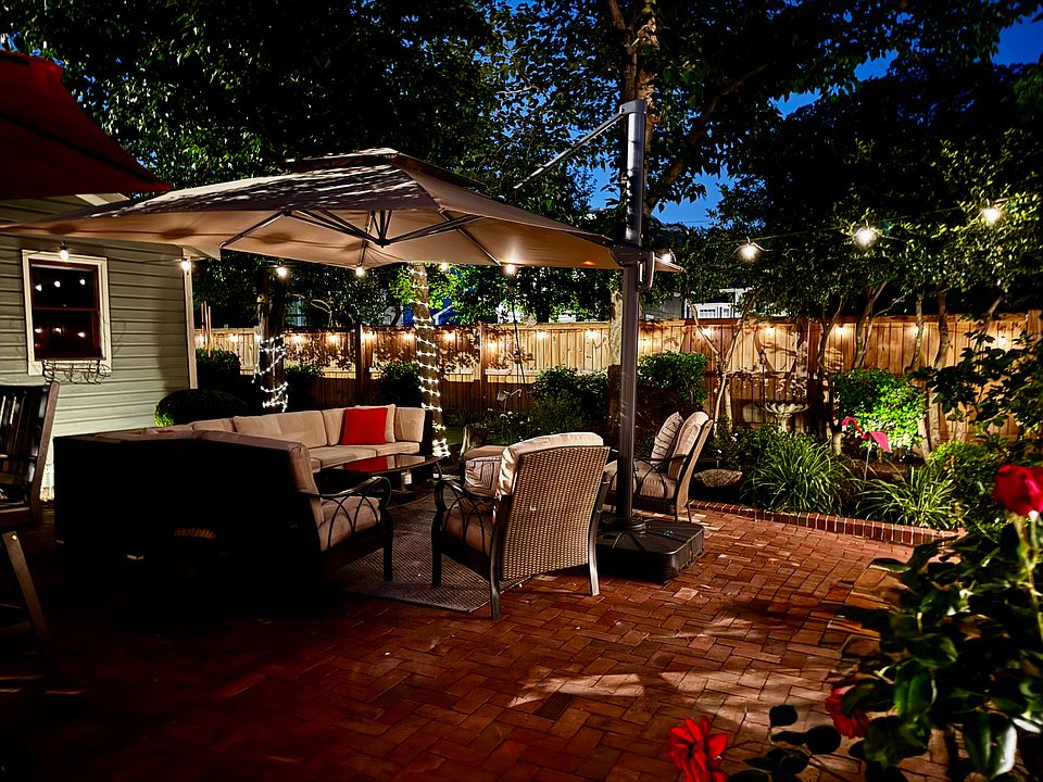 Back yard at night with solar lights.