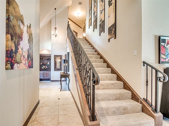 Beautiful ironwork and built-in at both ends of hall
