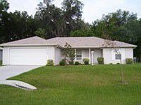 Great Ocala Home back to a Huge Horse Farm