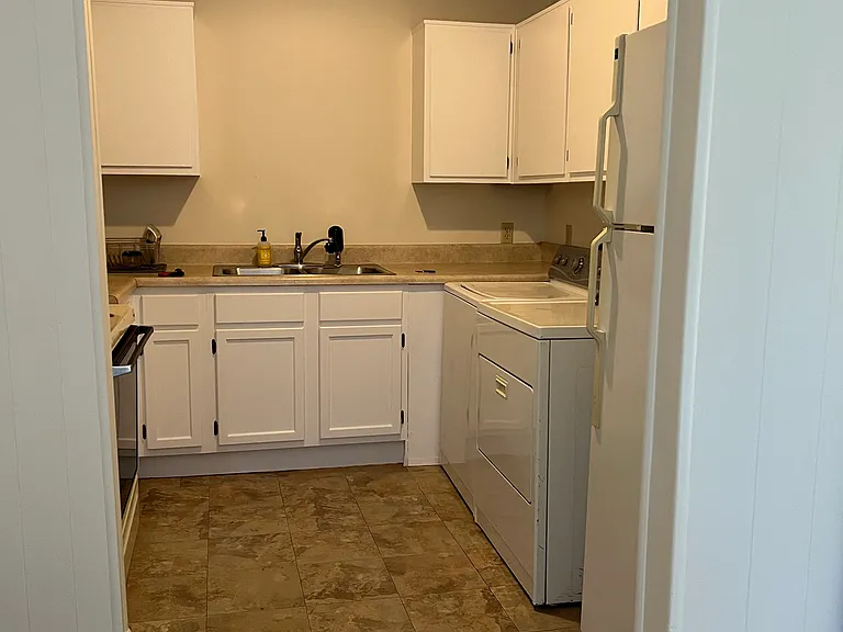 Kitchen has new refrigerator