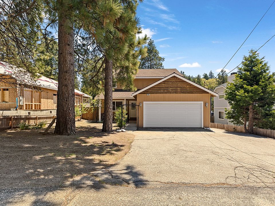 Level entry and parking with 2 car garage.