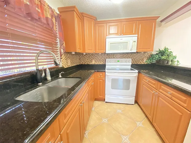 6535 W 24th Ct #2-12 — Photo 5