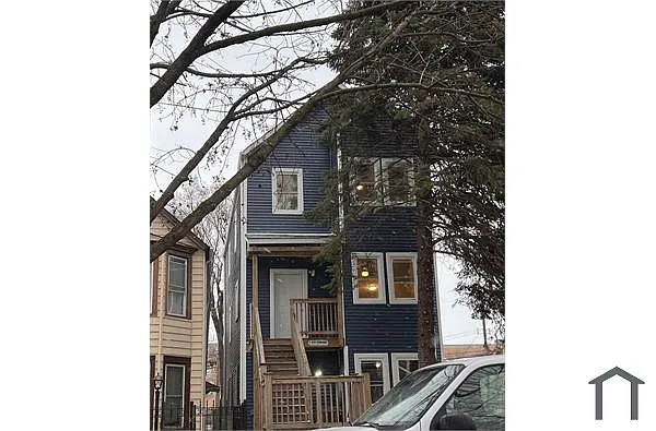 Building Photo - 8317 S Buffalo Ave #1
