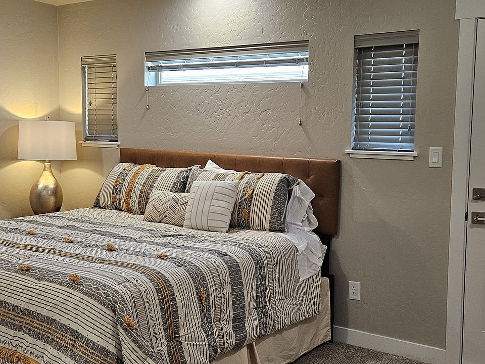 Enjoy a good night's sleep in this cozy room on a king bed.