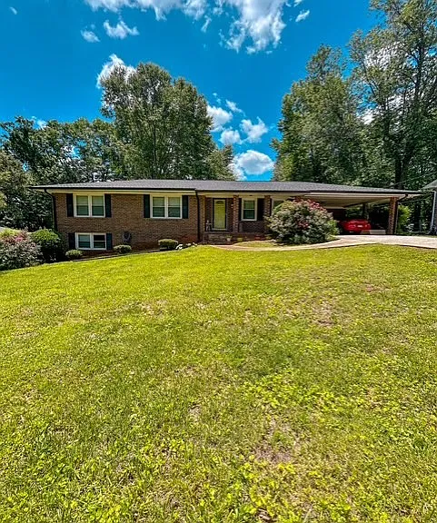 5583 Woodland Dr — Photo 1