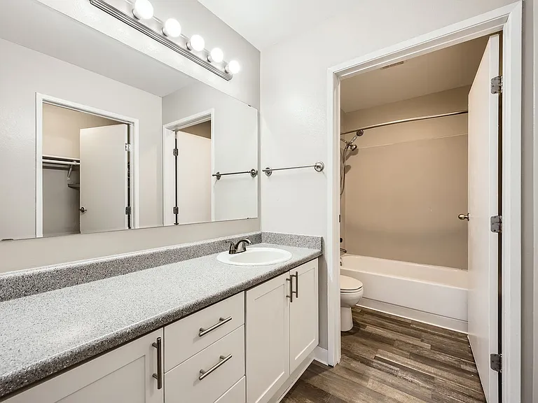 Primary bathroom in a two-bedroom two-bath apartment at Capitol City in Lacey, WA