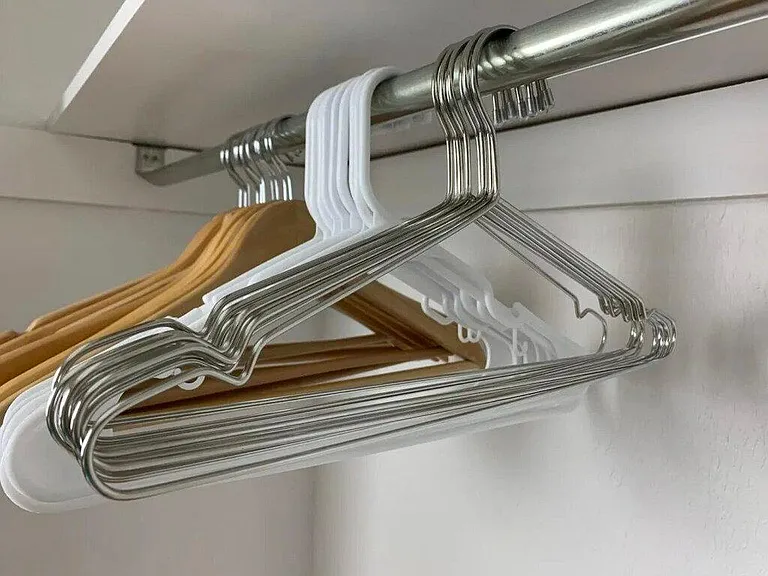 Pack light and stay organized with the clothing hangers provided.