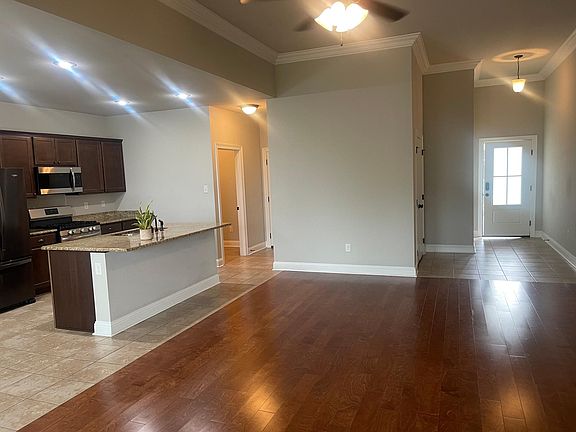 Open concept, front entrance, kitchen, laundry room left, to garage