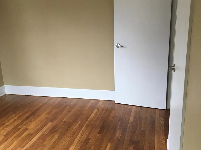 Rear bedroom - closed closet door on right