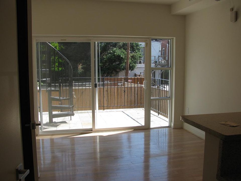 Living room looking toward patio from open kitchen