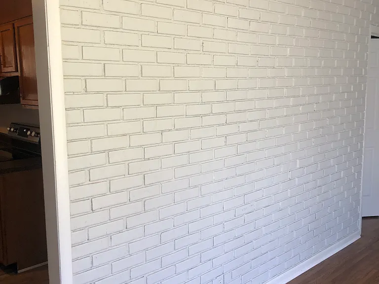 Beautiful designer faux brick wall in living room