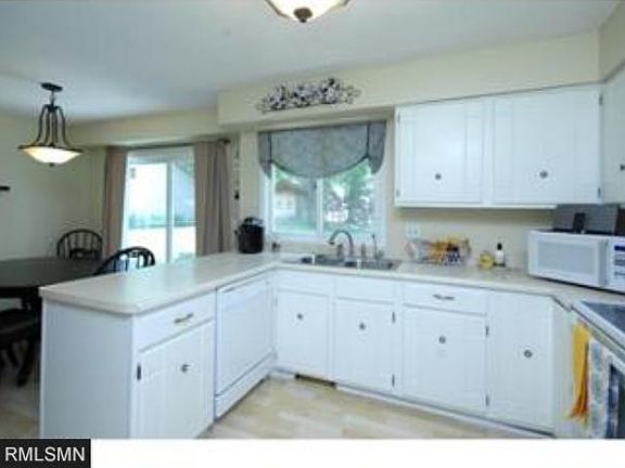 4th image of 6855 Norwood Ln N
