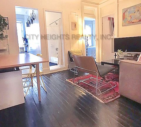 2nd image of 329 E 14th St APT 2B