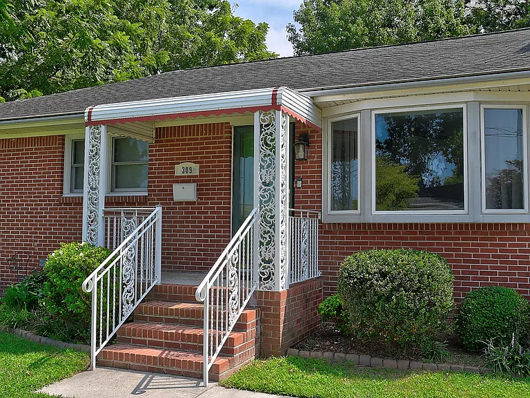 Classic Norfolk brick ranch with great features