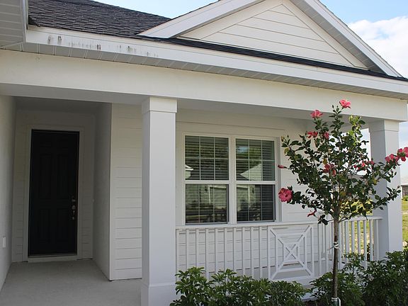 Small and comfortable front porch to accommodate a couple adirondack chairs