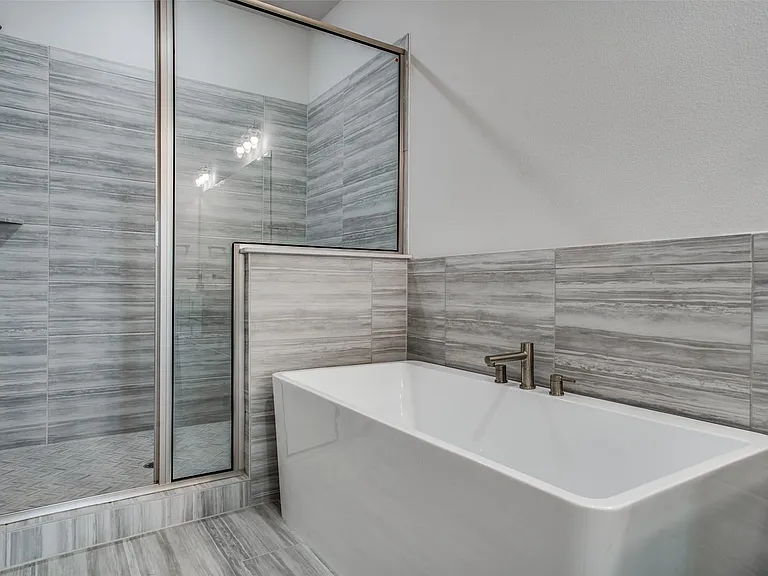 Double shower and soaker tub.