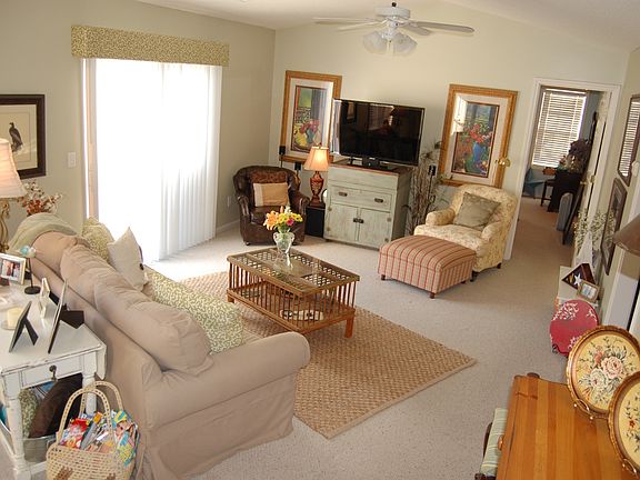 Den with vaulted ceiling