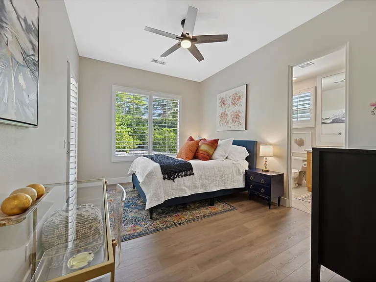 Citrus Suite with queen bed, ensuite bathroom and walk in closet; access to the citrus garden outside