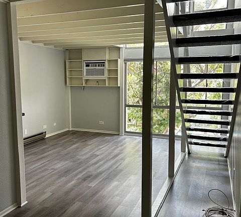 Downstairs living space and loft staircase