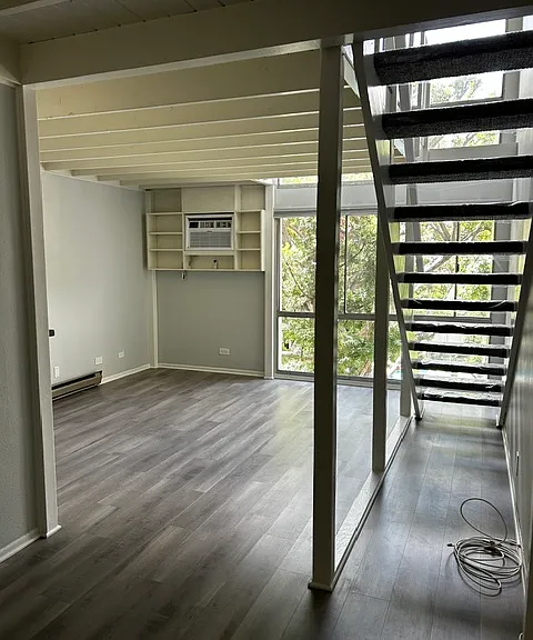 Downstairs living space and loft staircase