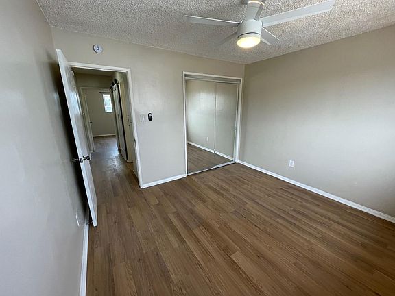 New flooring, doors, trim and ceiling fan
