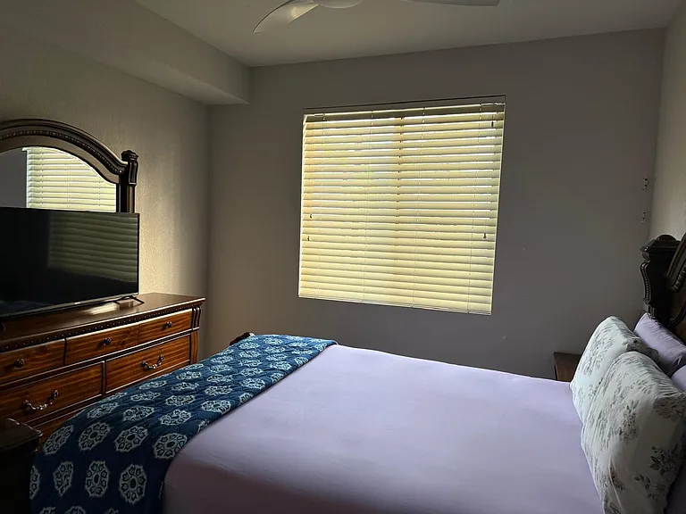 Second Bedroom accommodates Queen-size Bed dresser and 2 night stands
