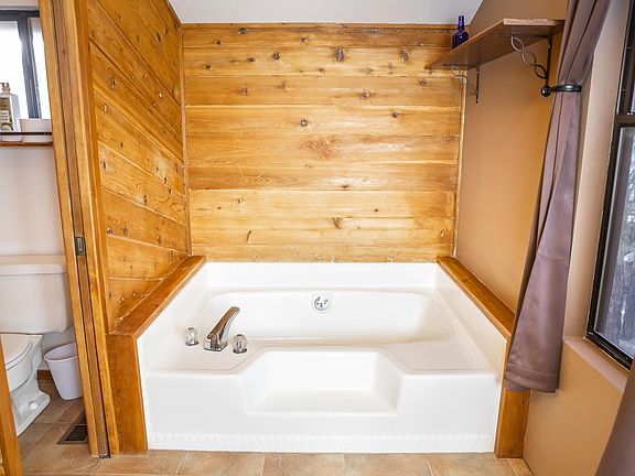 Upstairs master bathroom. Also step in shower with glass slider door not pictured.