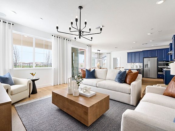 Gathering room opens to kitchen