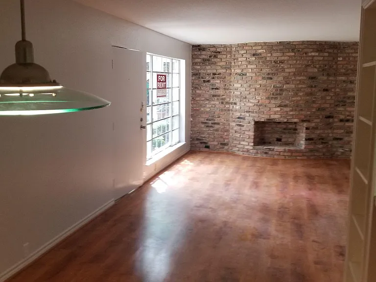 Wood Flooring throughout Living & Dining. Dining Area Features.