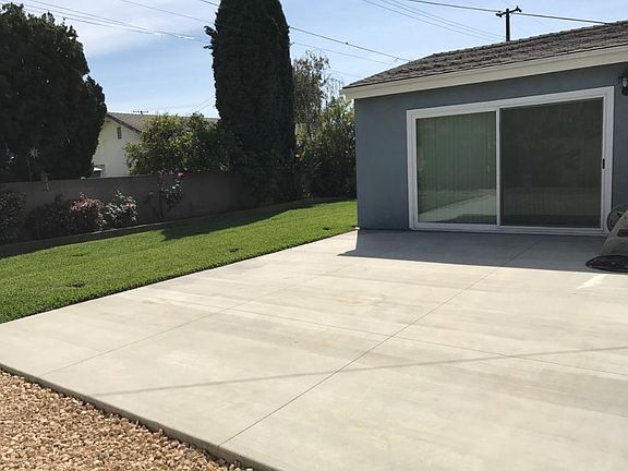 Back yard view showing the patio deck
