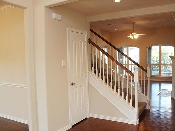 First impressions are important, beautiful wood floors flow through the entry, formal living, formal