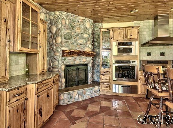 gas fireplace in kitchen with remote