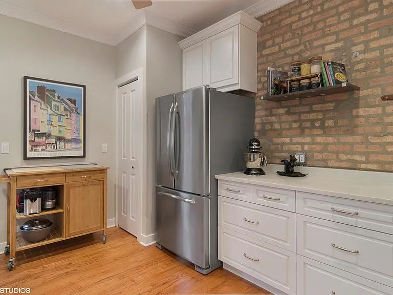 Kitchen with view of pantry