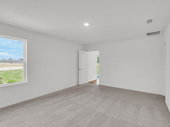 The spacious master bedroom will fit all of your furniture