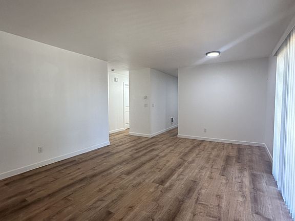 Living Room, Looking Towards Kitchen & Hallway