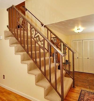 Staircase with custom railing